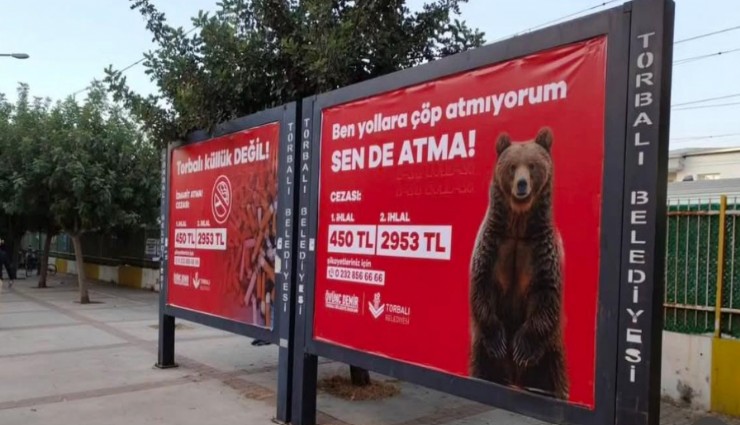 Torbalı Belediyesinden yaratıcı kampanya: Yerlere çöp atanlara ayılı mesaj