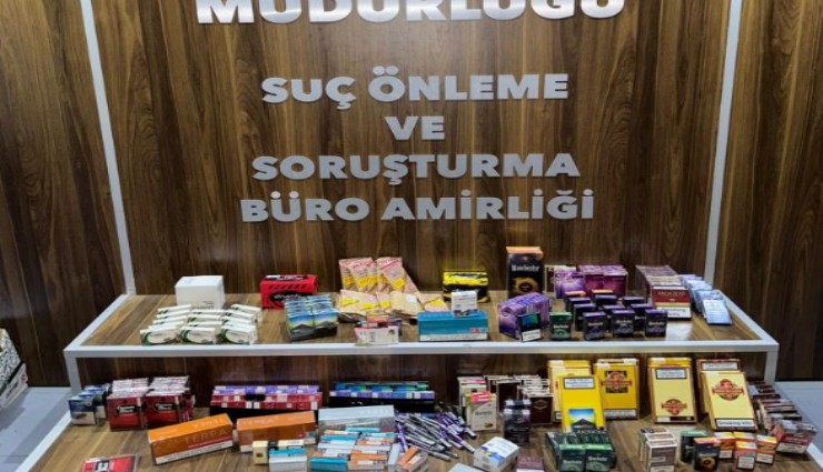 İzmir'de tekel bayisine kaçak sigara ve ilaç operasyonu