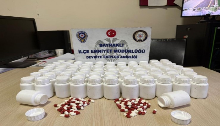 Mezarlıkta  bulduğu poşetin içinden uyuşturucu hap çıktı