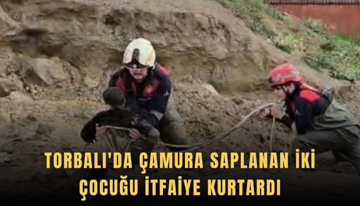 Torbalı'da çamura saplanan iki çocuğu itfaiye kurtardı